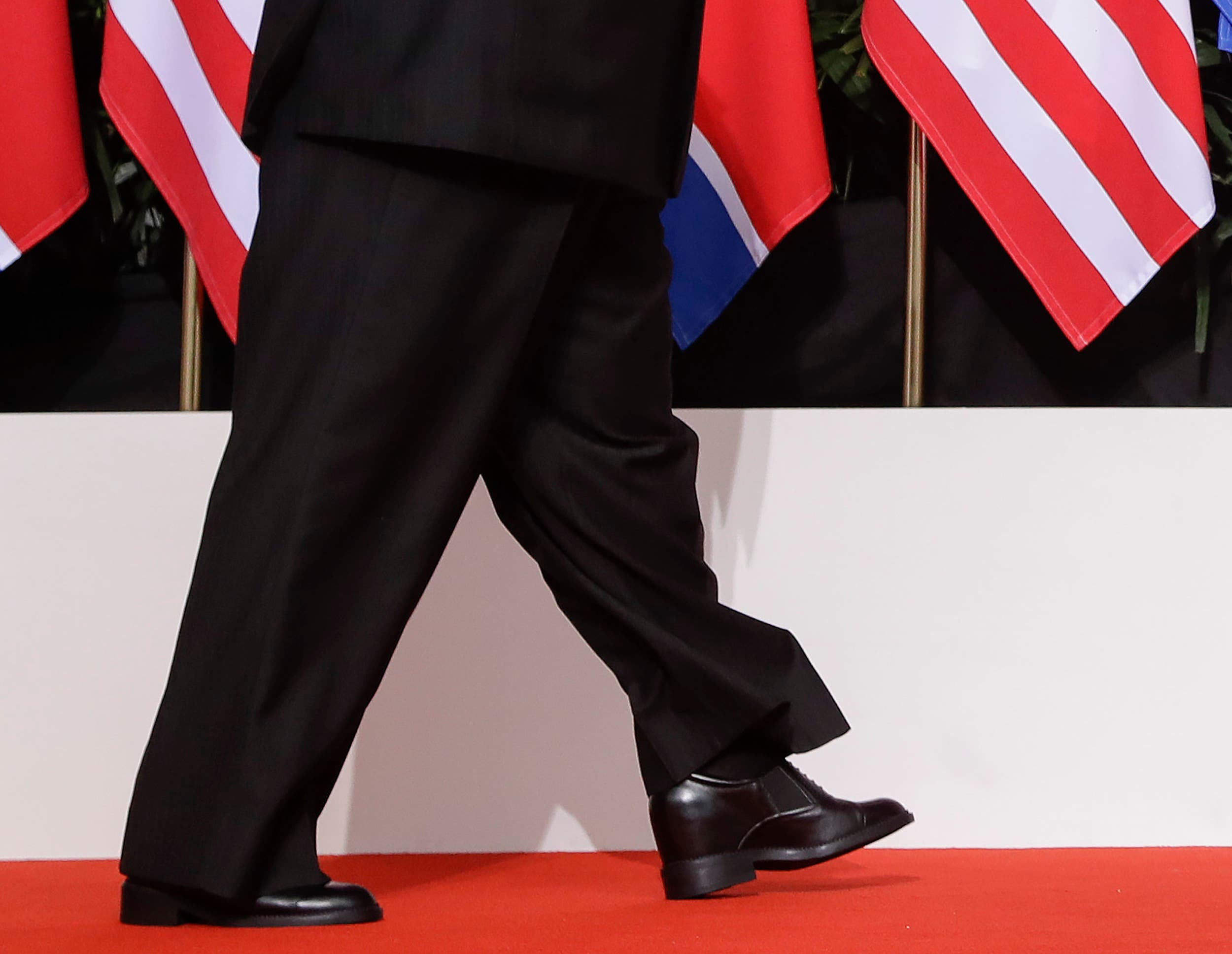 Kim is about 5.8 feet tall, about 7.2 inches shorter than Trump. But when the two stood together, the difference in their heights wasn’t that noticeable. (AP)