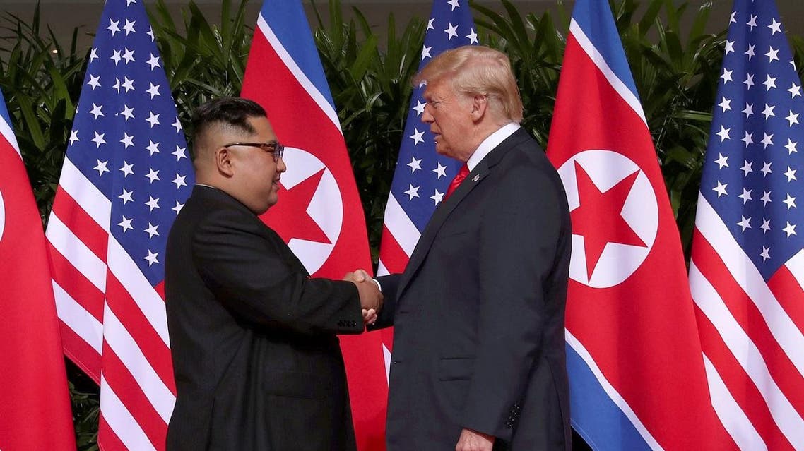 U.S. President Donald Trump shakes hands with North Korean leader Kim Jong Un at the Capella Hotel on Sentosa island in Singapore. (Reuters)