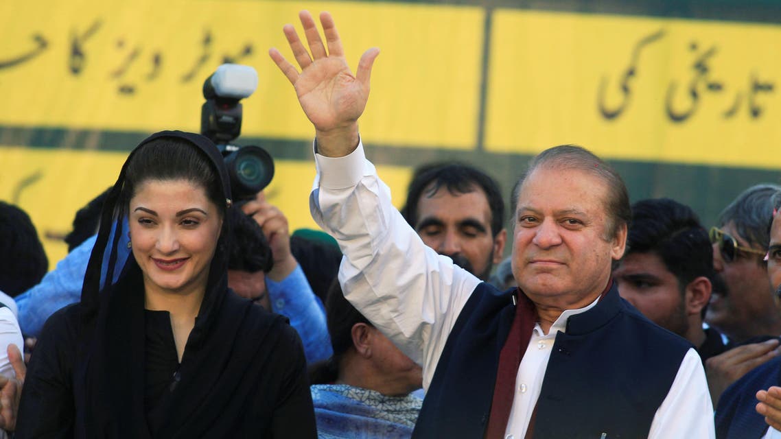 Nawaz Sharif (R), former Prime Minister and leader of Pakistan Muslim League, gestures to supporters as his daughter Maryam Nawaz looks on during party’s workers convention in Islamabad on June 4, 2018. (Reuters)
