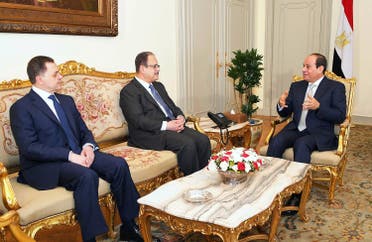 Sisi (R) meeting with his newly-appointed Interior Minister Mahmoud Tawfiq (L), and his predecessor Magdi Abdel Ghaffar (C) at the presidential palace in Cairo. (AFP)