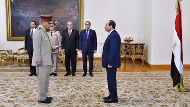 Sisi listens to the swearing in of newly appointed Defense minister General Mohamed Ahmed Zaki. (Reuters)