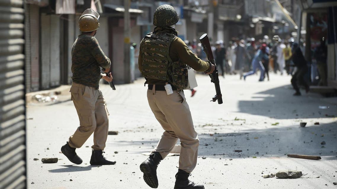 Indian government forces and Kashmiri protestors clash in downtown Srinagar on June 8, 2018. (AFP)