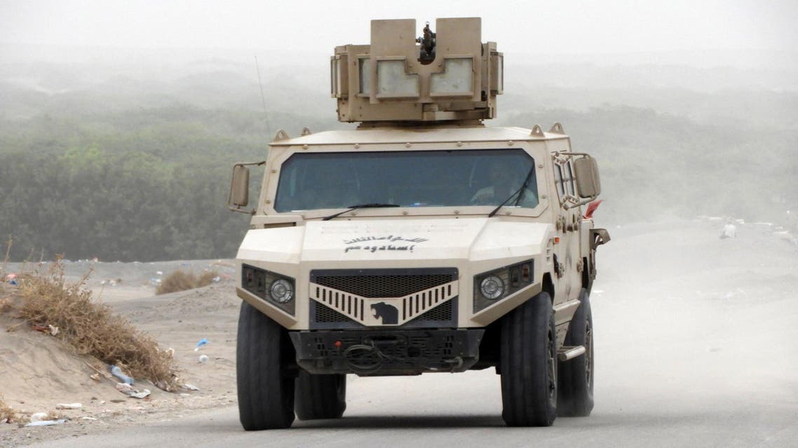 A column of Yemeni pro-government forces and armoured vehicles arrives in al-Durayhimi district, about nine kilometres south of Hodeidah international airport on June 13, 2018. (AFP)