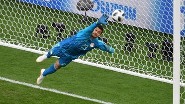 Egypt's goalkeeper Mohamed El Shenawy makes a save from a Uruguay's forward Edinson Cavani shot during the Russia 2018 World Cup Group A football match. (AFP)