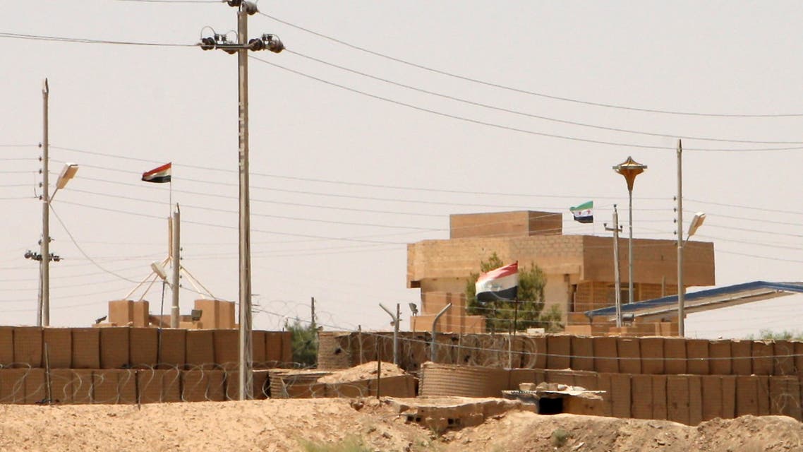 A general view shows the Iraq-Syria border point, Abu Kamal, that is still in the hands of the rebel Free Syrian Army, on July 22, 2012. Of the three main crossings between Syria and Iraq, rebels have maintained control over the Abu Kamal border point since the evening of July 19, and briefly held the Yarabiyah crossing along the northern part of the two countries' frontier. AFP PHOTO / AZHAR SHALLAL