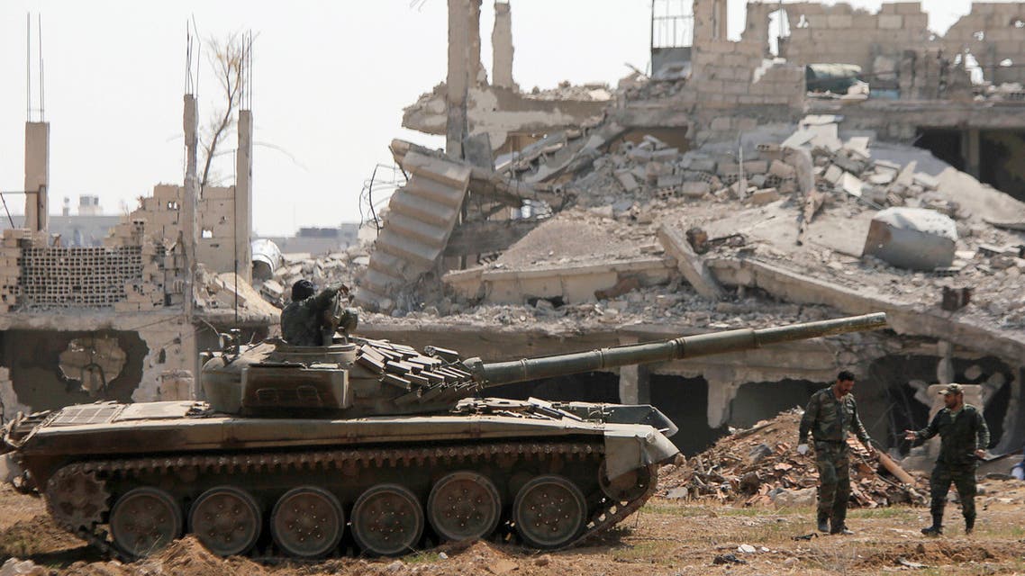 Soldiers loyal to Syria's President Bashar al-Assad forces are deployed at al-Qadam area near Yarmouk Palestinian camp in Damascus, Syria April 29, 2018. REUTERS/
