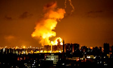An explosion is seen in Gaza City after an airstrike by Israeli forces on June 18, 2018.  (AFP)