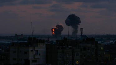 An explosion is seen at Rafah town in the southern Gaza Strip after an airstrike by Israeli forces on June 20, 2018. Israeli fighter jets hit 25 targets in the Gaza Strip early June 20 in response to rocket fire from the Palestinian territory, the army said. (AFP)