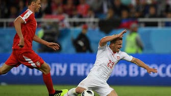Switzerland strike late to sink Serbia 2-1