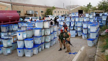 Ballot boxes are seen after a fire at a storage site in Baghdad, housing the boxes from Iraq's May parliamentary election. (Reuters)