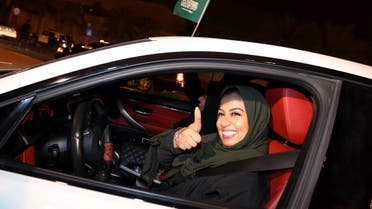 A Saudi woman celebrates as she drives her car in her neighborhood, in Al Khobar, Saudi Arabia. (Reuters)