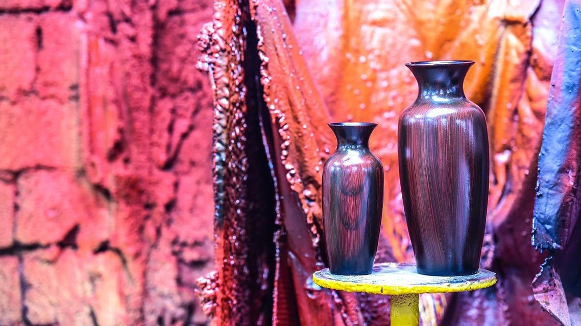 As a law student in Egypt’s Menufiya province, Mustafa al-Agoury was simply looking for a job to get him through his last year of classes.But when a friend gave him a pottery kiln, the young man “fell in love” with the craft, which he quickly turned into a profession. “A friend gave me an oven as a gift, and I worked on it at home... in one year, I fell in love with the trade,” said Agoury, now 40, speaking from his workshop in the village of Shamma, in the Nile Delta province north of Cairo. He and his 15 employees extract clay from different types of soil found across Egypt, particularly along the Red Sea coast and near the southern Nile River city of Aswan. They work on large wooden benches, cluttered with pots of paint, rudimentary tools and classically shaped vases decked out in wild colours. Row upon row of grey, unfinished pieces line the workshop’s edges, waiting to be given a glossy finish.Some are spray-painted with bright hues of blue, green, yellow or red -- sometimes a swirl of all four. Others are hand-painted. It takes between seven and 10 days to finish one piece, depending on its size. Agoury estimated his workshop produces about 1,000 pieces a month, many of which take pride of place in the salons of Cairo.