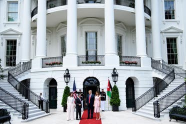 President Trump (2R) and First Lady Melania Trump greet Jordan’s King Abdullah II and Queen Rania in Washington, DC on June 25, 2018. (AFP)