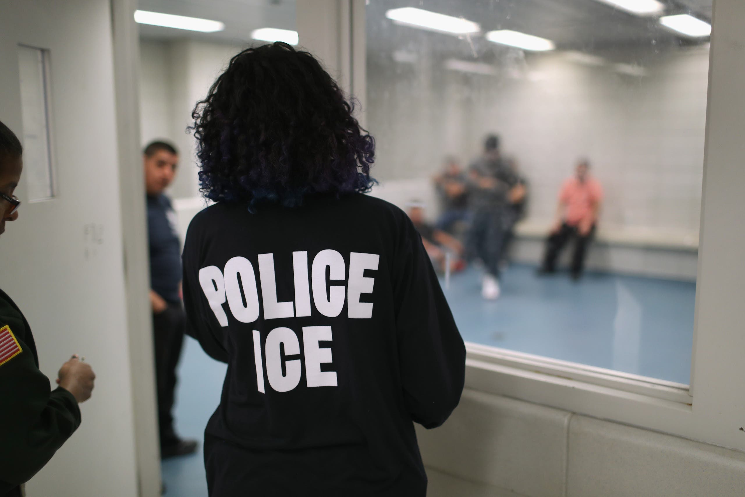 Undocumented immigrants wait in a holding cell at a U.S. Immigration and Customs Enforcement (ICE). (AFP)