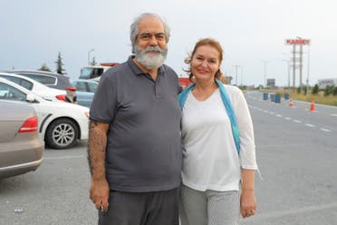 Journalist Mehmet Altan waves to media after being released from the prison in Silivri, near Istanbul, Turkey, June 27, 2018. REUTERS