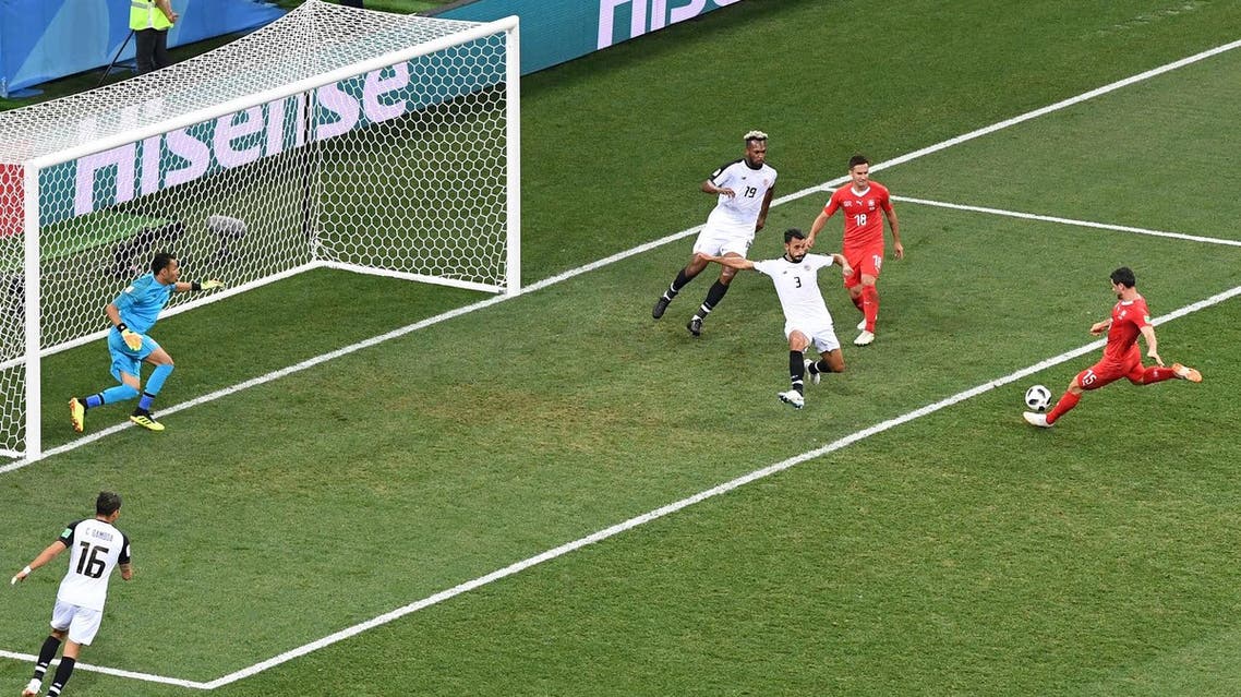 Switzerland’s midfielder Blerim Dzemaili (R) scores the opening goal during the 2018 World Cup Group E football match against Costa Rica on June 27, 2018. (AFP)
