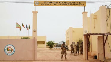 A Malian Army soldier with the G5 Sahelstands at the entrance of a G5 Sahel command post in Sevare. (AFP)