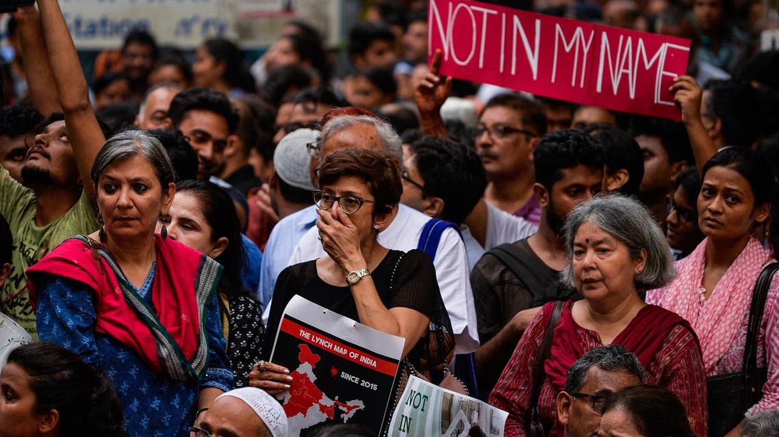 Indian protesters gather for a ‘Not in my name’ silent protest in New Delhi on June 28, 2017, following a spate of anti-Muslim killings. (AFP)