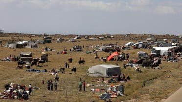 Syrian refugees from Daraa province in southern Syria are gathering near Quneitra in the Israeli-occupied Golan Heights on Friday. (AFP).