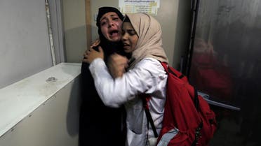 The aunt of 14-year-old Palestinian boy Yasser Abu Al-Naja, who was killed by Israeli forces at the Israel-Gaza border, reacts at a hospital morgue in the southern Gaza Strip, on June 29, 2018. (Reuters)