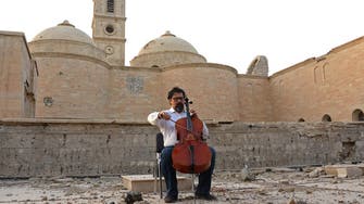 Ruins of Iraq’s Mosul under the spell of Cellist Karim Wasfi’s music