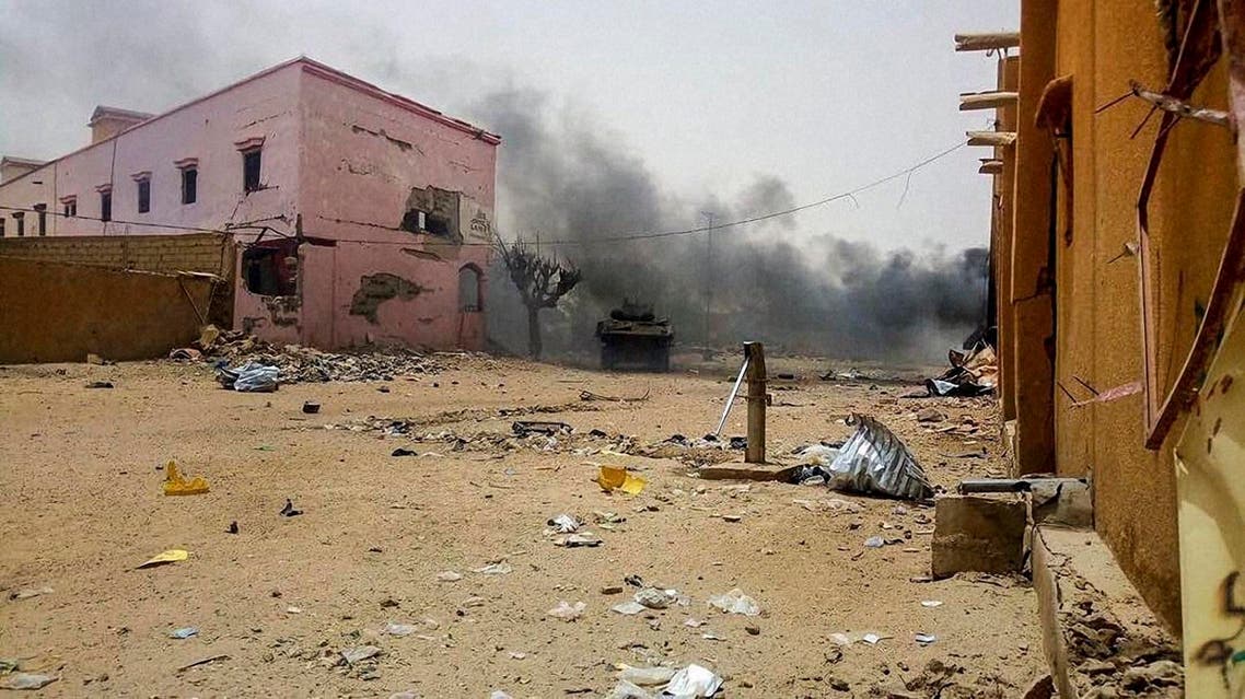 Smoke billows from the site of an explosion in Gao on July 1, 2018, targeting French soldiers operating in northern Mali. (AFP)