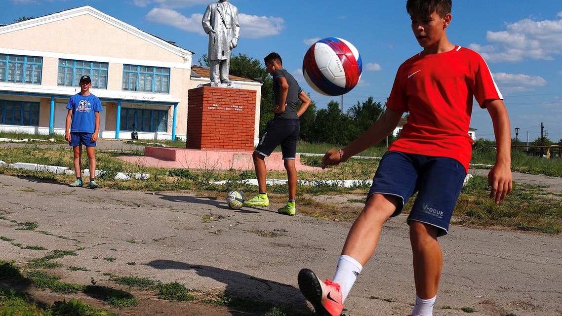 Dimitri Strazhkov dreams about becoming a professional player with CSKA Moscow and one day being called up to play for Russia's national team. The 15 year-old and other boys of all ages train every day at a small soccer field in the village of Aleksandrovka that was built only five years ago. (Reuters)