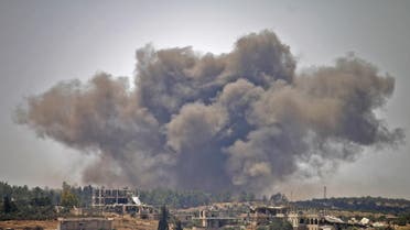 Smoke rises above opposition held areas of the city of Daraa during airstrikes by Syrian regime forces on June 28, 2018. (AFP)