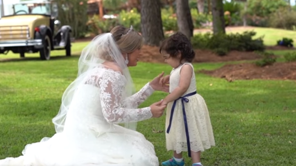 Watch 3 Year Old Cancer Survivor At Bone Marrow Donor S Wedding As Flower Girl Al Arabiya English