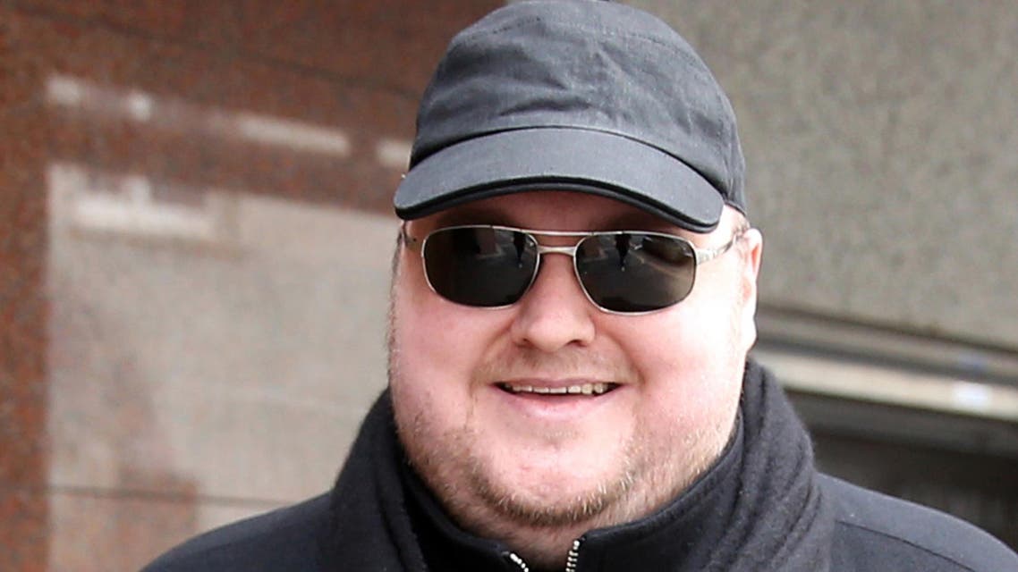 Kim Dotcom leaves court for lunch in Auckland on September 21, 2015, as he fights a US bid to extradite him from New Zealand. (AFP)