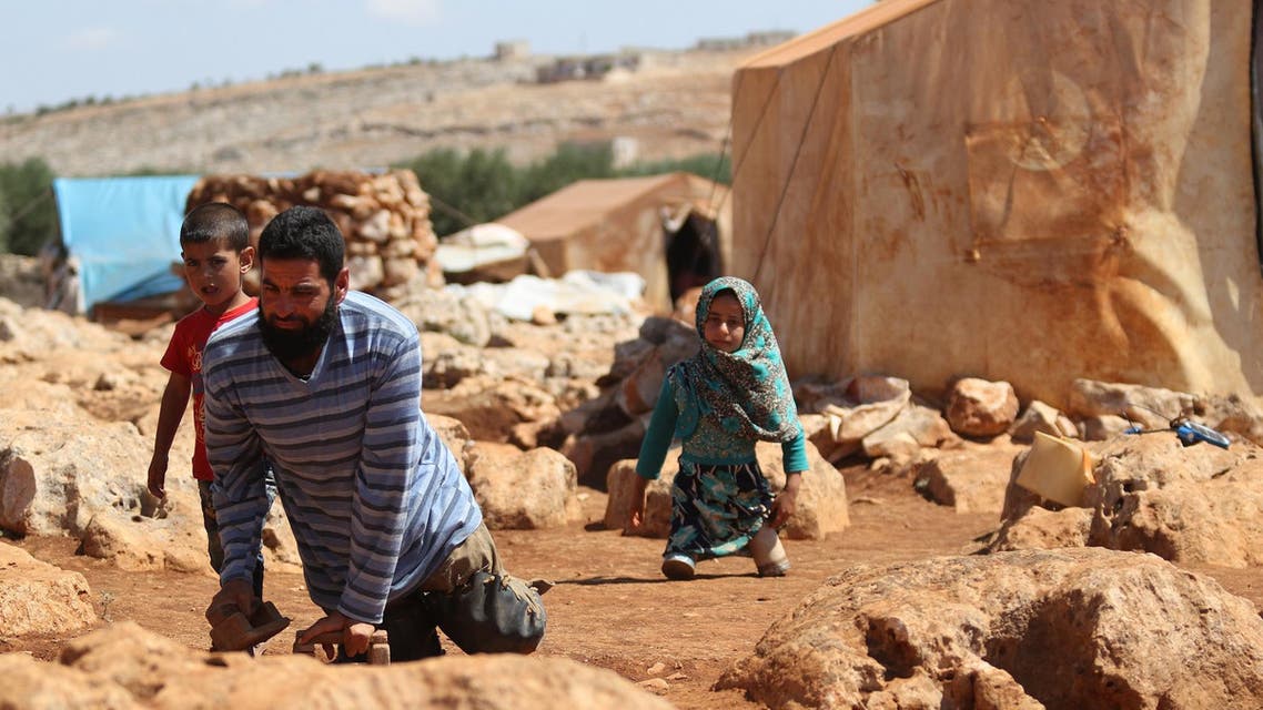 Maya had to shuffle around a camp in northern Syria on makeshift limbs fashioned from old tubing and tin cans. (AFP)