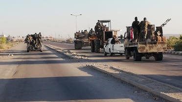 عناصر من قوات النظام السوري عند معبر نصيب الحدودي مع الأردن