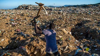 IN PICTURES: Migrants in Morocco seen scavenging for food in rubbish dump