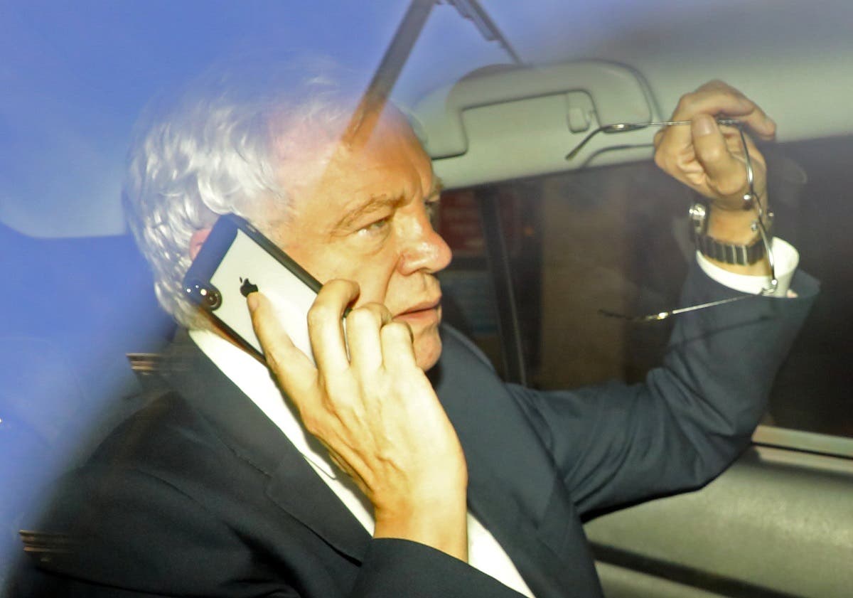 Britain's former Secretary of State for Exiting the European Union David Davis leaves the BBC by taxi in central London. (Reuters)
