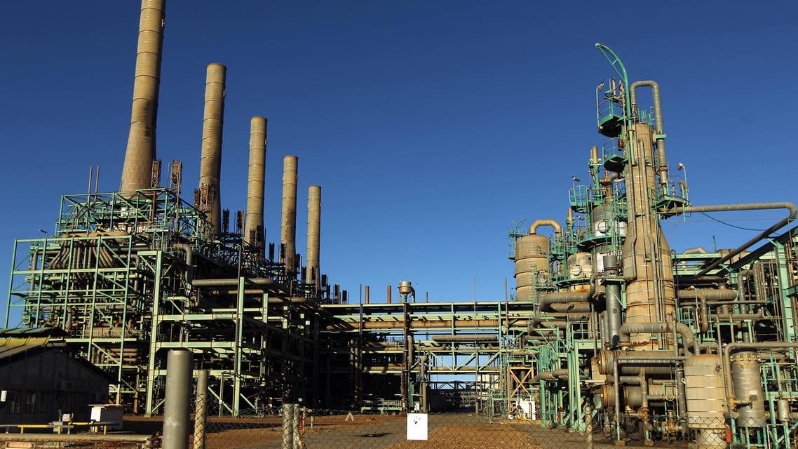 In this file photo taken on January 11, 2017 a general view shows an oil refinery in Libya's northern town of Ras Lanuf on January 11, 2017. Libya is resuming oil exports from its eastern production heartland, its National Oil Corporation said On July 11, 2018 after a showdown between the war-torn country's rival authorities. The internationally recognised NOC was handed back control of four terminals in the oil crescent on Wednesday morning, it said in a statement, adding that. (AFP)