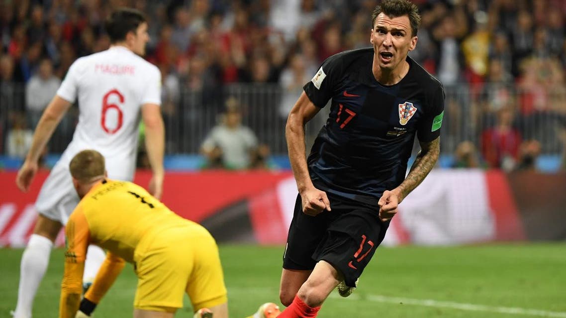 Croatia’s forward Mario Mandzukic celebrates after scoring his team’s second goal during the Russia 2018 World Cup semi-final football match between Croatia and England at the Luzhniki Stadium in Moscow on July 11, 2018. (AFP)