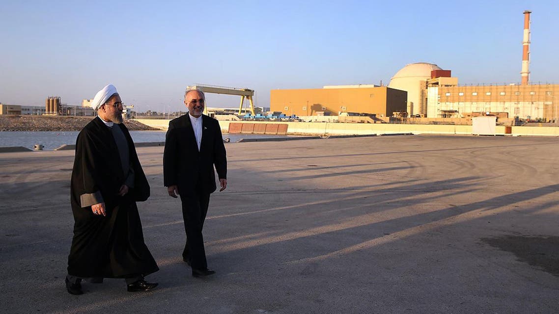 Iranian President Hassan Rouhani with Iran’s Atomic Energy Organisation chief Ali Akbar Salehi at the Bushehr nuclear power plant on January 13, 2015. (AFP)