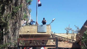 Syrian regime prepares to raise flag over rebel-held Daraa city