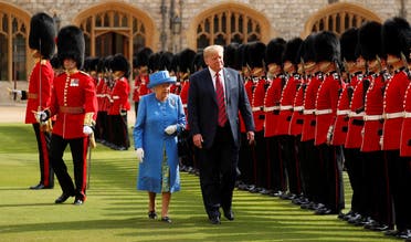 US President Donald Trump and Britain’s Queen Elizabeth inspect the Coldstream Guards during a visit to Windsor Castle in Windsor, Britain, July 13, 2018. (Reuters)