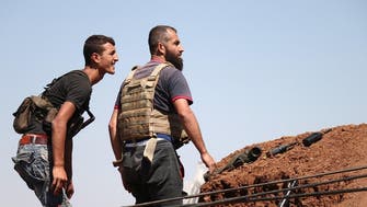 Syrian rebels surrender heavy weapons in Daraa city