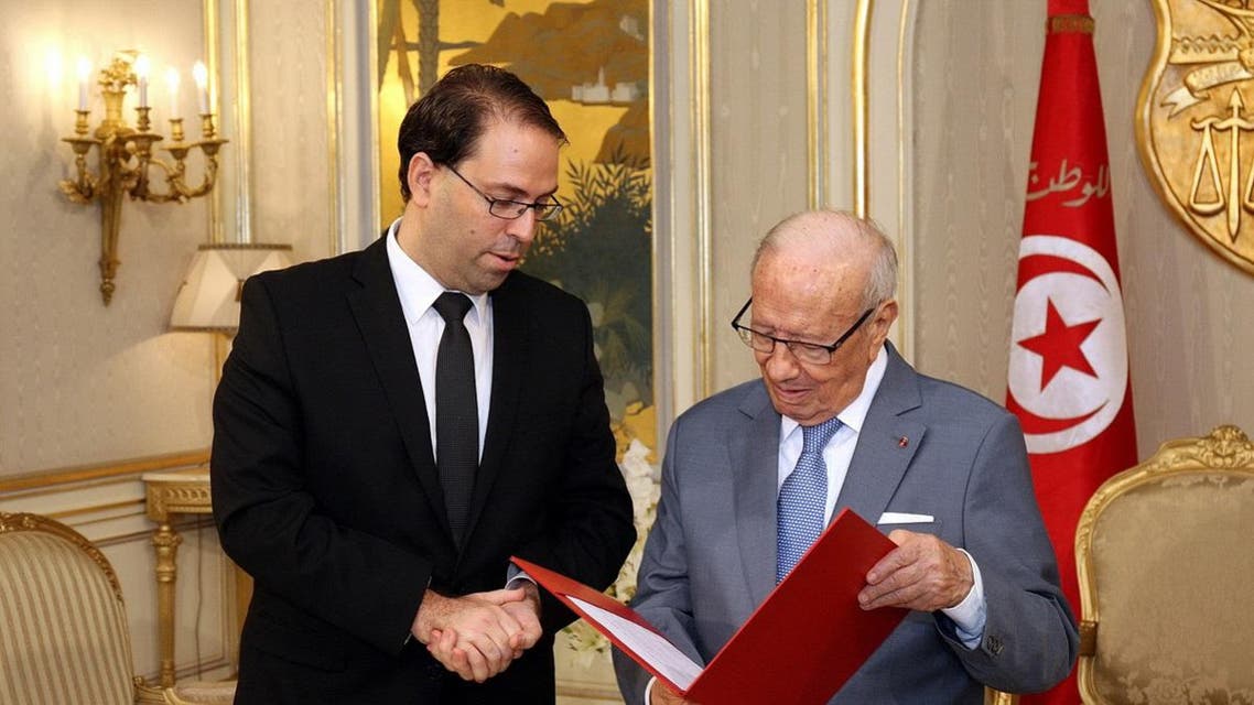 Tunisia's Prime Minister Youssef Chahed presenting his new cabinet to Tunisian President Beji Caid Essebsi at the Carthage Palace. (File photo: AFP)