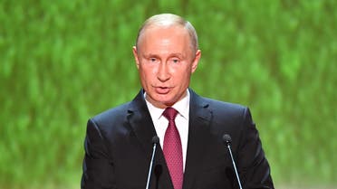 Russia's President Vladimir Putin addresses the audience during a gala concert at the Bolshoi Theatre on the eve of the soccer World Cup final match in Moscow, Russia July 14, 2018. Yuri Kadobnov/Pool via REUTERS