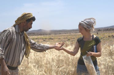 Amaia Arranz-Otaegui, a University of Copenhagen postdoctoral researcher in archaeobotany, and Ali Shakaiteer, a local assistant to researchers working at an archeological site in the Black Desert in northeastern Jordan, collecting wheat. (Reuters)