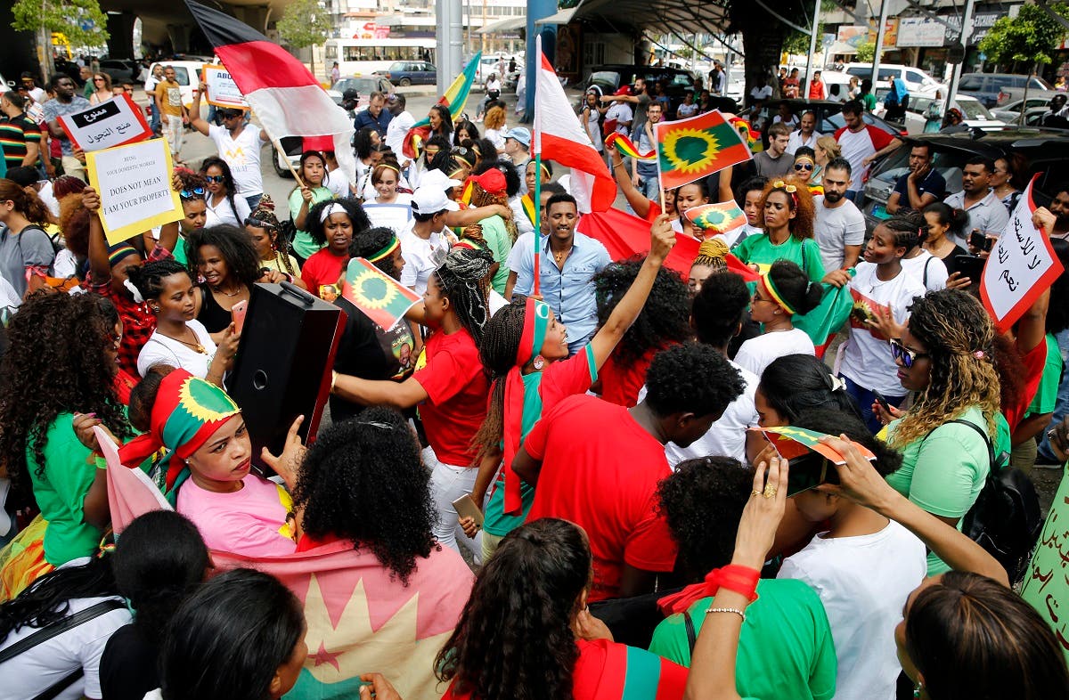Migrant domestic workers dance during a rally to mark International Domestic Workers Day, in Beirut, Lebanon, Sunday, June 24, 2018. The protesters are demanding that the Kafala, or sponsorship law, be abolished, and called for better treatment. The Kafala system ties workers to their employers whose consent is needed for renewal of residency permits, changing jobs or for workers to return home. (File photo: AP)
