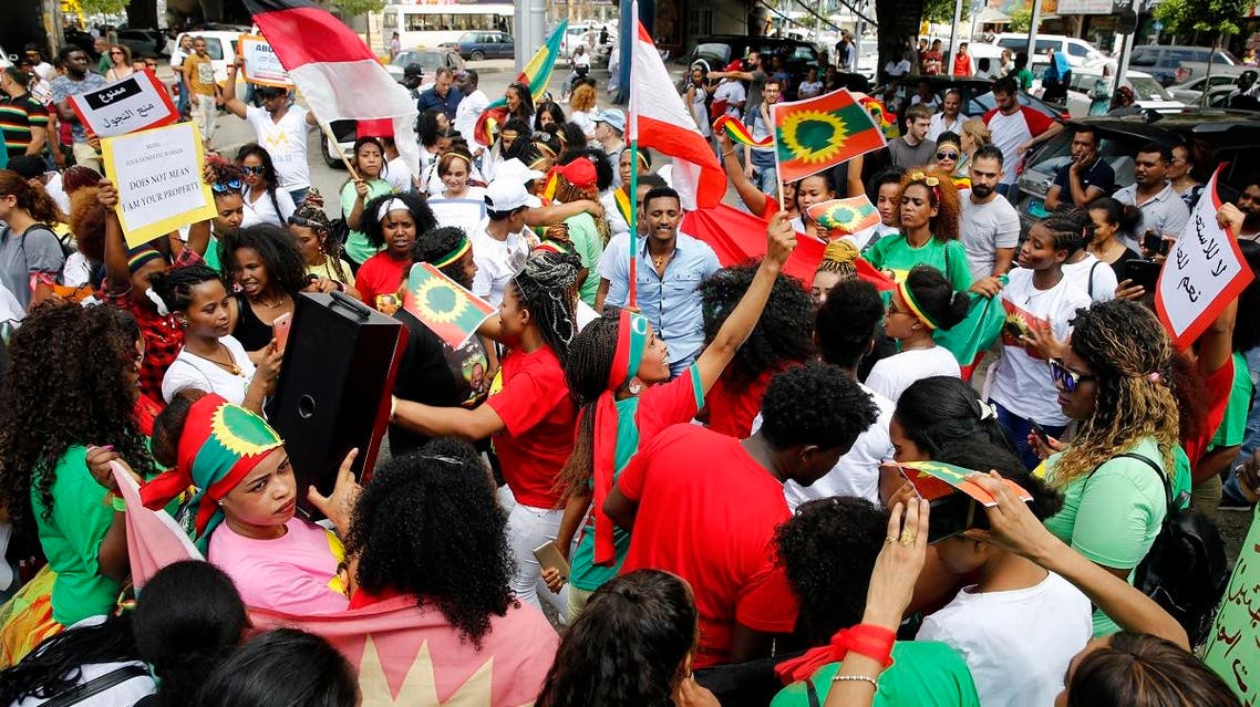 Migrant domestic workers dance during a rally to mark International Domestic Workers Day, in Beirut, Lebanon, Sunday, June 24, 2018. The protesters are demanding that the Kafala, or sponsorship law, be abolished, and called for better treatment. The Kafala system ties workers to their employers whose consent is needed for renewal of residency permits, changing jobs or for workers to return home. (AP) 