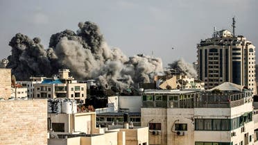 A picture taken on July 14, 2018 shows smoke plumes rising following an Israeli air strike in Gaza City. (AFP)