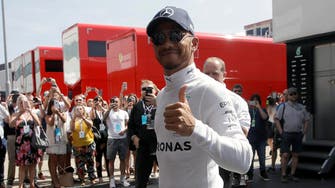 F1 champion Lewis Hamilton signs new contract with Mercedes