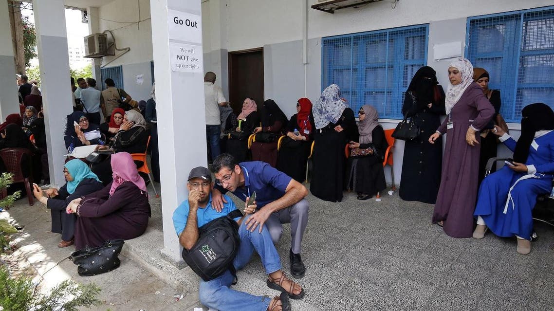Palestinian employees of the United Nations agency for Palestinian refugees UNRWA. (AFP)