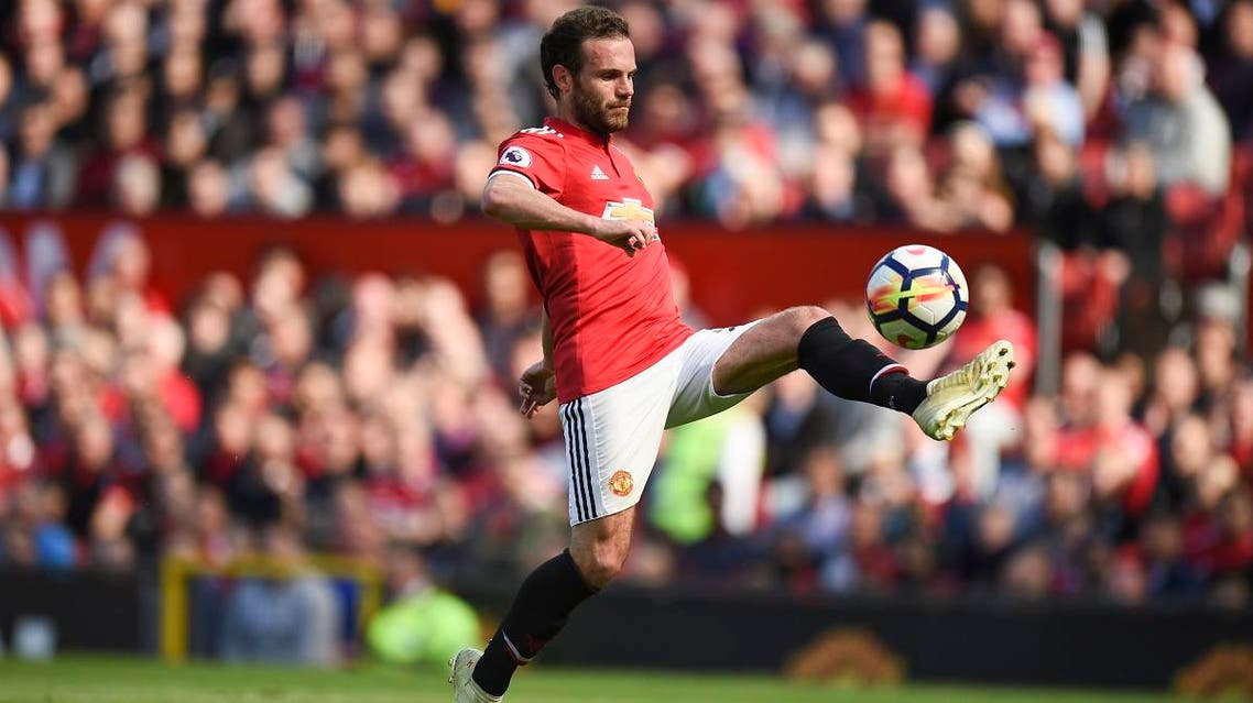 Manchester United’s Spanish midfielder Juan Mata controls the ball during the English Premier League football match between Manchester United and Watford at Old Trafford in Manchester, north west England. (AFP)