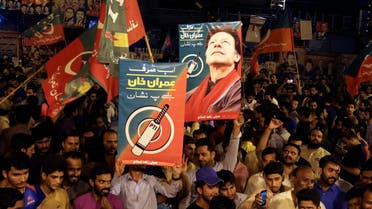 Supporters of Imran Khan celebrate unofficial results in Islamabad on July 25, 2018. (AP)